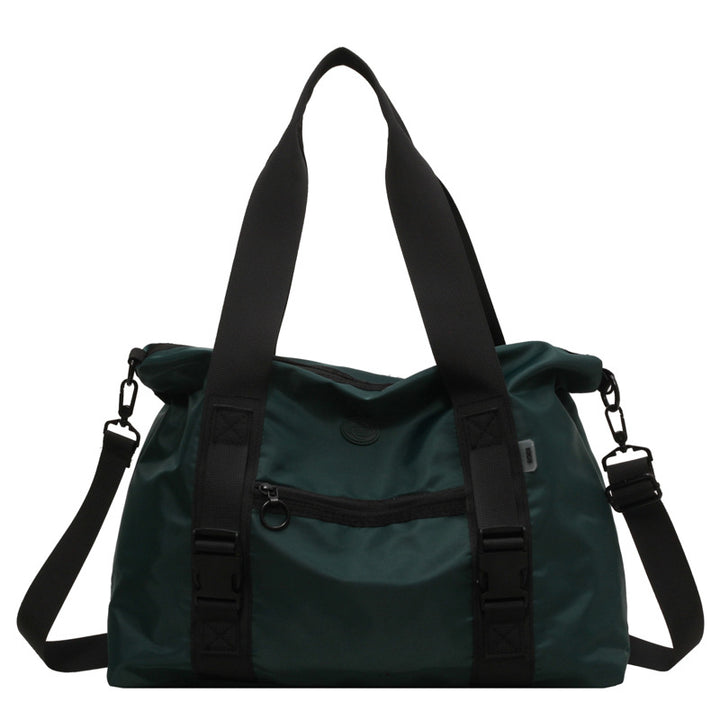 Romslig sport duffel bag med ergonomiske bærehåndtak og vannavvisende materiale Skanto