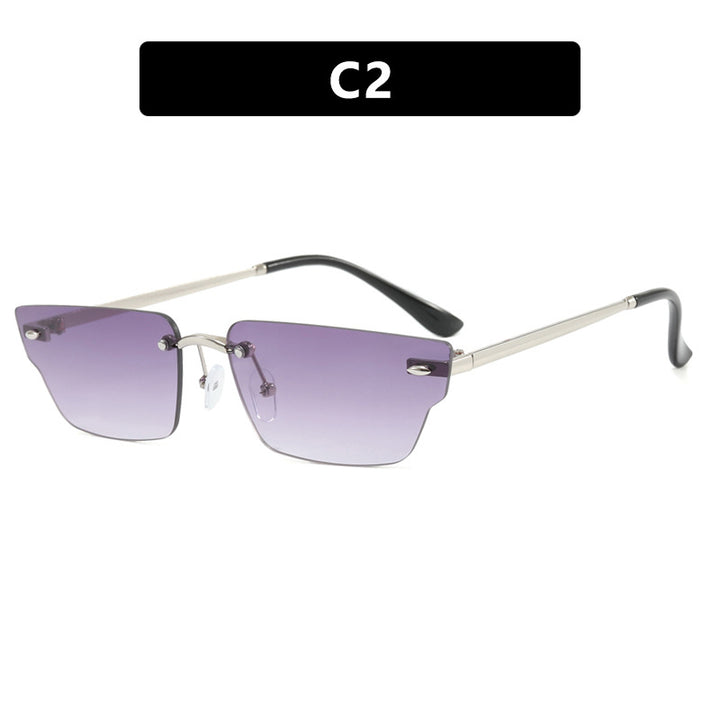 Dame geometrisk solbrille med filigranramme og transparente glass Skanto