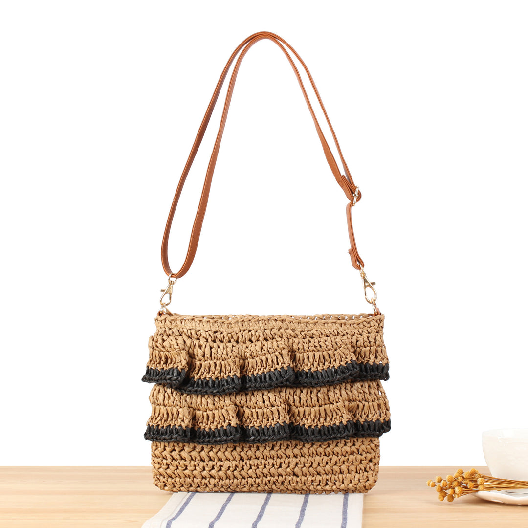 Ruffle design handbag made of braided raffia Skanto