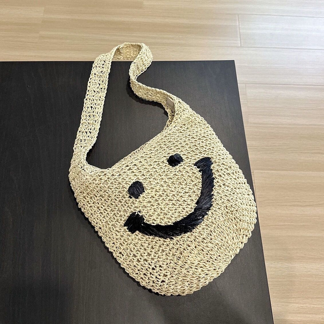 Håndveske med smilende motiv Skanto