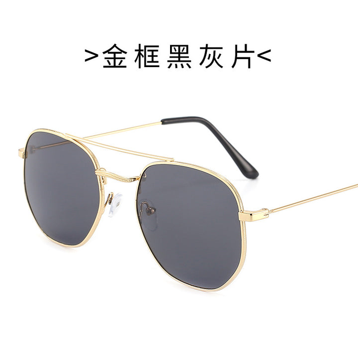 Dame solbrille med oval ramme og beskyttende gradientlinse Skanto