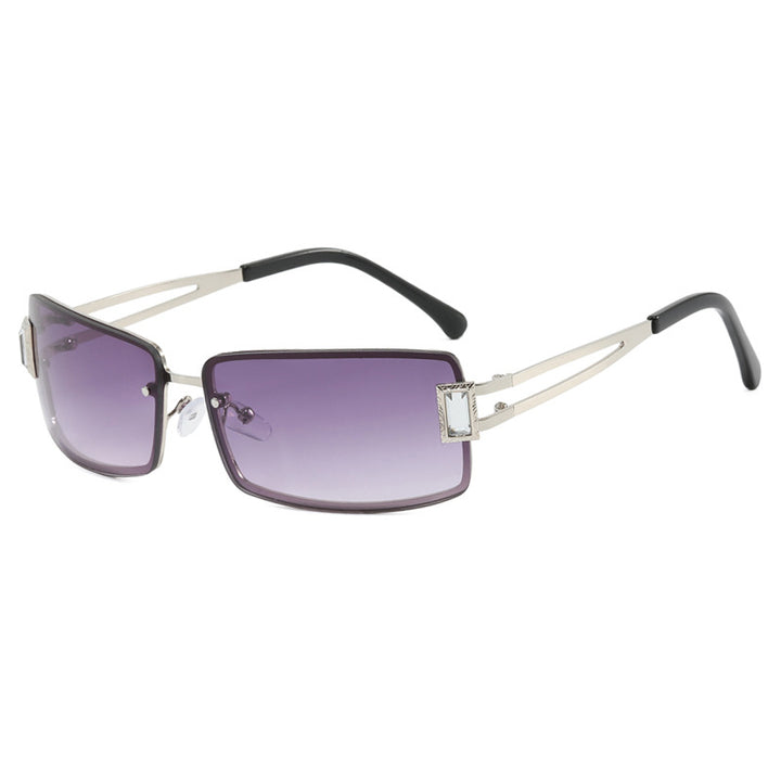 Dame stilig solbrille med elegante trapezformede glass og filigran metallramme Skanto