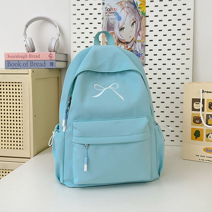 Minimalist bue-smokket skole ryggsekk