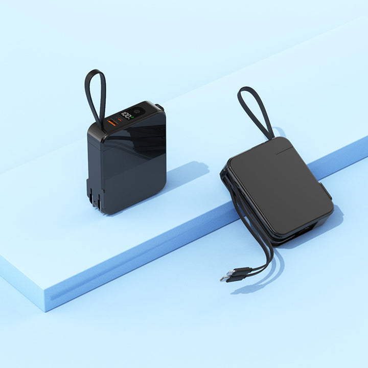 Bærbar powerbank med uttrekkbar ladekabel og digital skjerm Skanto