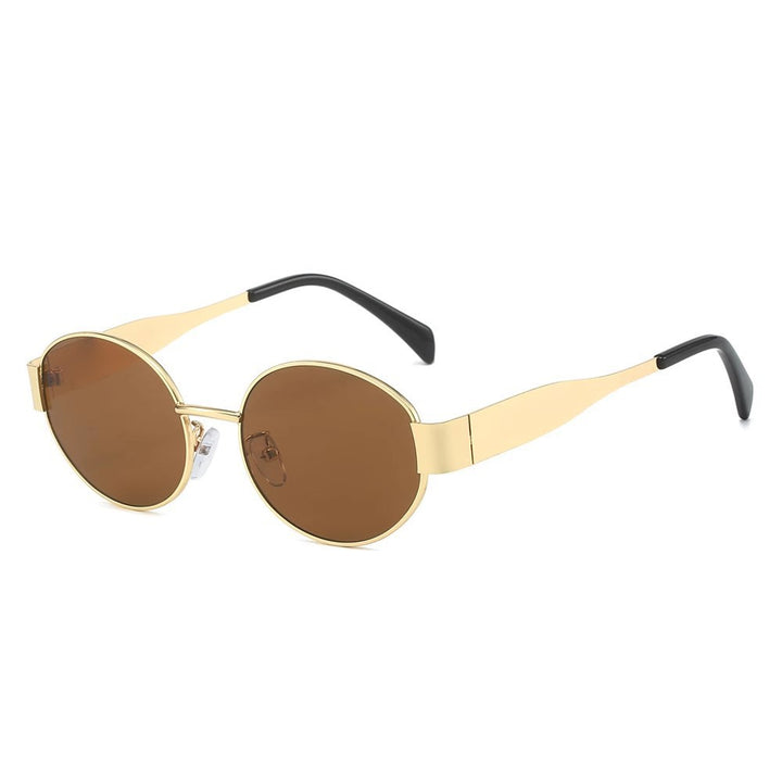 Dame moteriktig solbrille med elegant metallramme Skanto