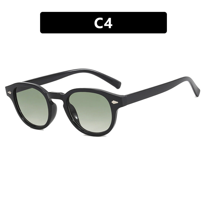 Dame rund solbrille med elegant design og UV-beskyttelse Skanto
