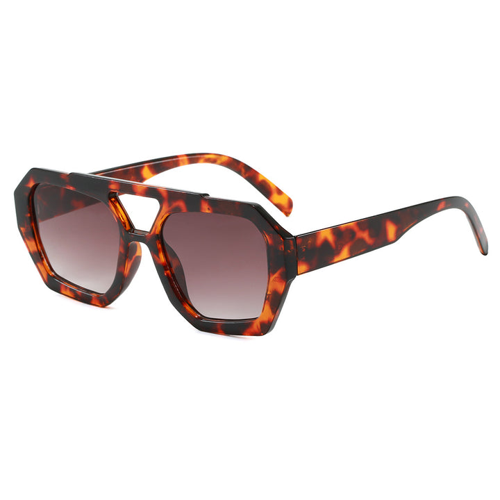 Dame geometrisk solbrille i ekstravagant design Skanto