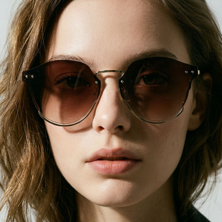 Dame designer solbrille Skanto