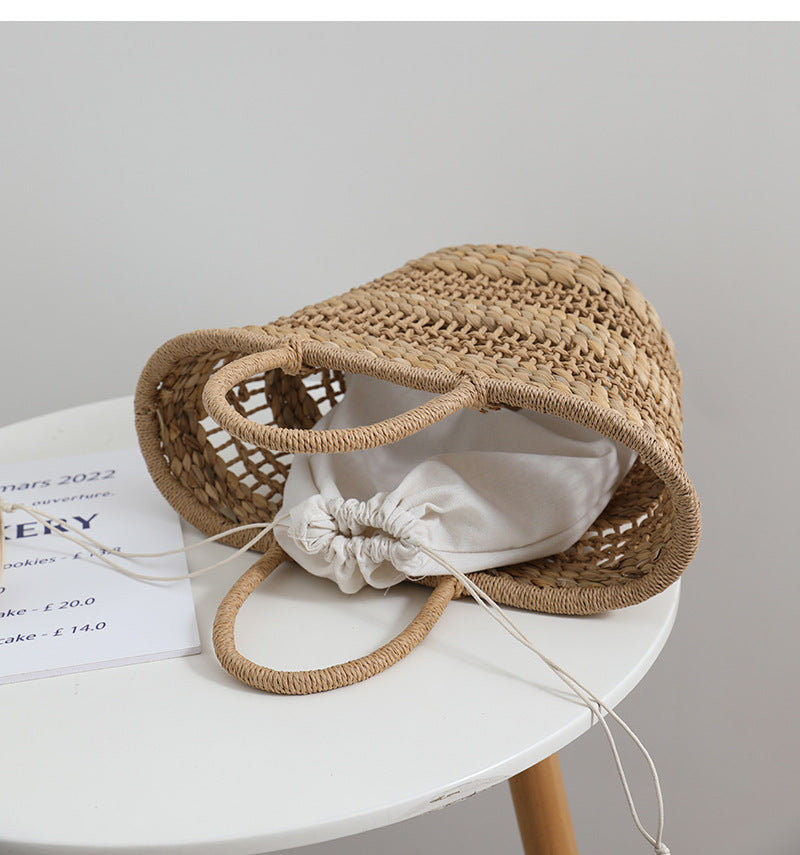 Håndlaget rattan-veske med en avtakbar innleggsfôr Skanto