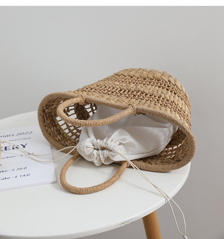 Håndlaget rattan-veske med en avtakbar innleggsfôr Skanto