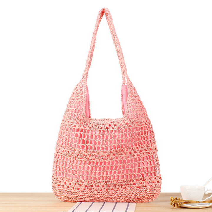 Handbag with floral appliqué in natural material Skanto