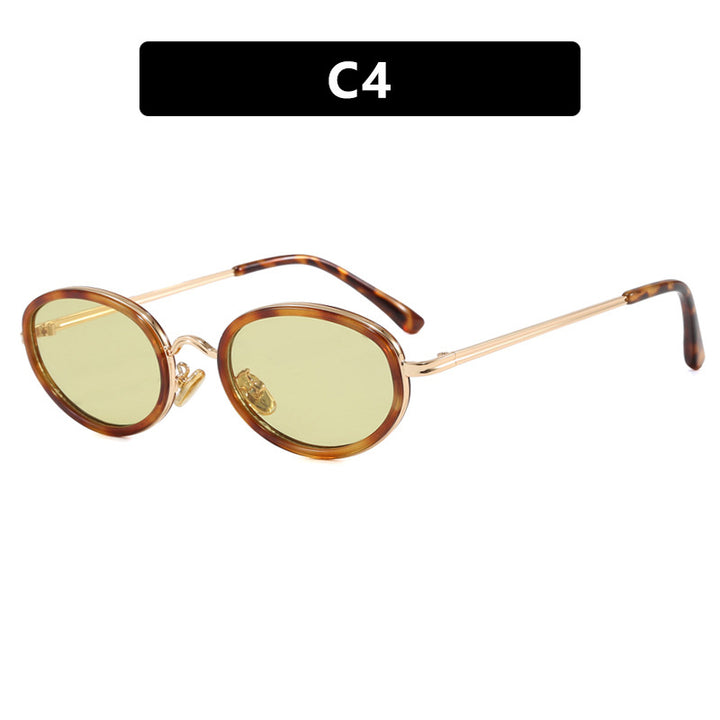 Dame elegant rund solbrille med moderne metallramme Skanto