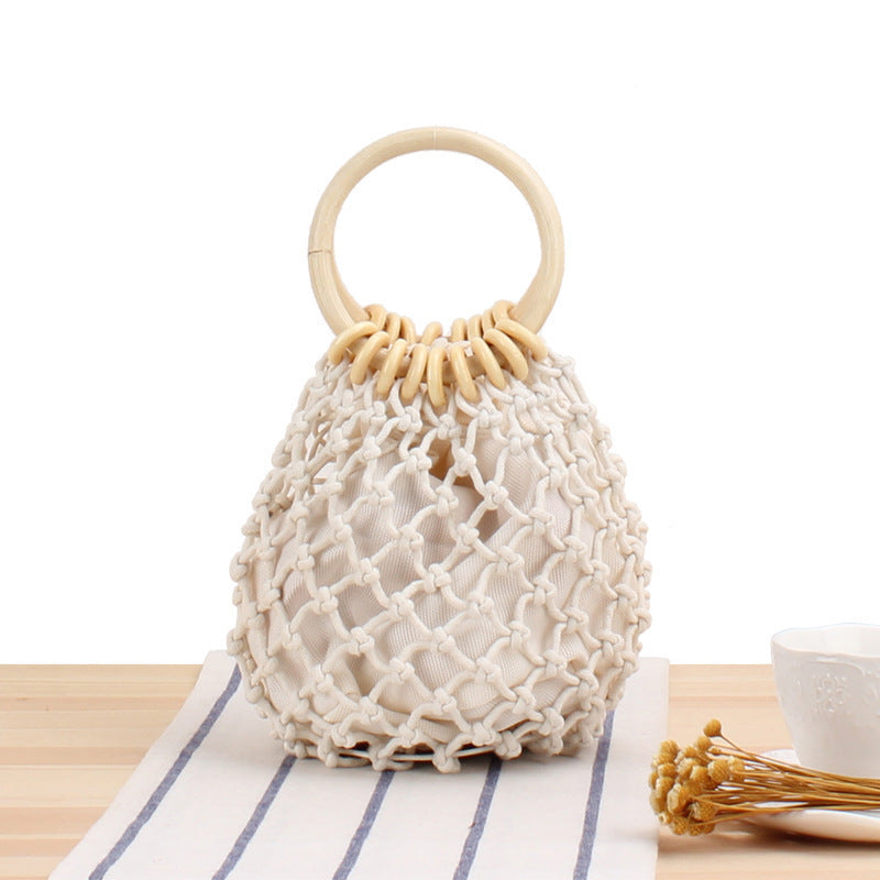Tote bag with hand-knotted net design and wooden handle Skanto