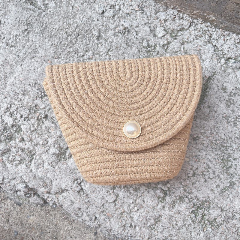 Dame Stilfull Clutch laget av flettet materiale Skanto