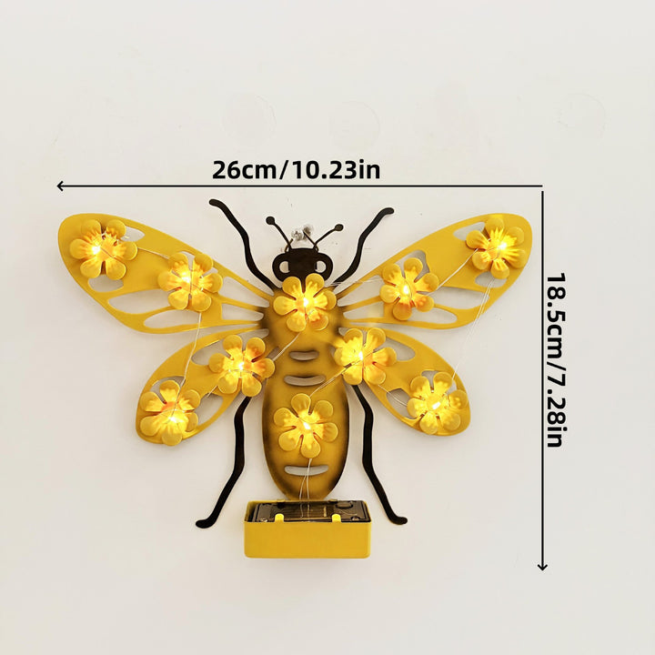Decorative Metal Bee Wall Light with Integrated Fairy LED Lamp and Solar Module Skanto