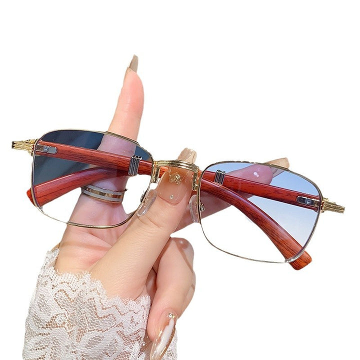 Dame solbrille med luksuriøs treinnfatning Skanto
