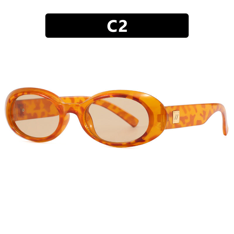 Dame eksklusiv solbrille i elegant ovalt design Skanto