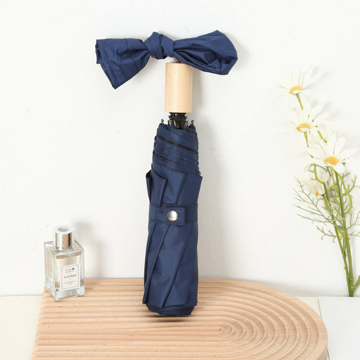 Damen Eleganter Falt-Regenschirm mit Holzgriff Skanto