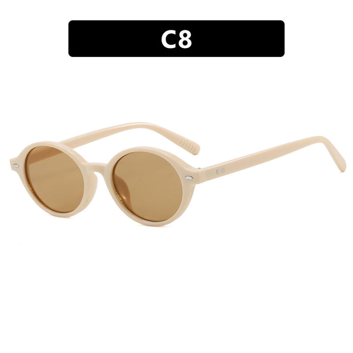 Dame rund solbrille med moderne design og polariserte glass Skanto