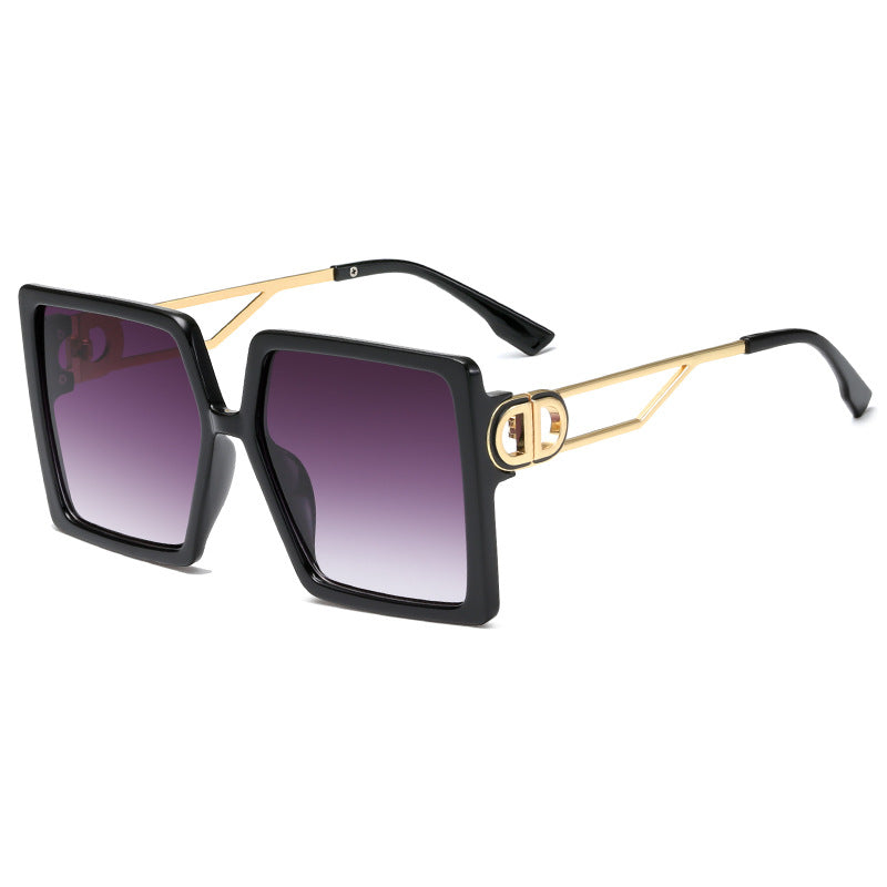 Dame oversized firkantet solbrille med elegant metallramme og polariserte glass Skanto