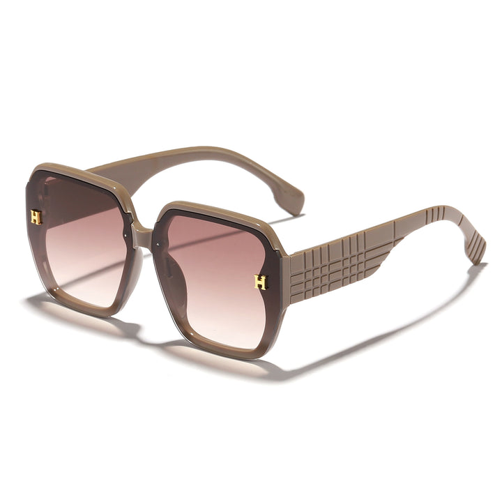 Damer moteriktig solbrille med kvadratisk ramme og trendy glass Skanto