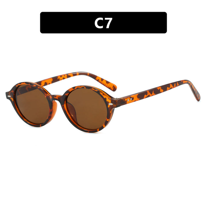 Dame rund solbrille med moderne design og polariserte glass Skanto