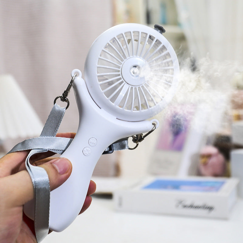 Kvinne bærbar mini håndvifte med sprayfunksjon og ergonomisk design Skanto