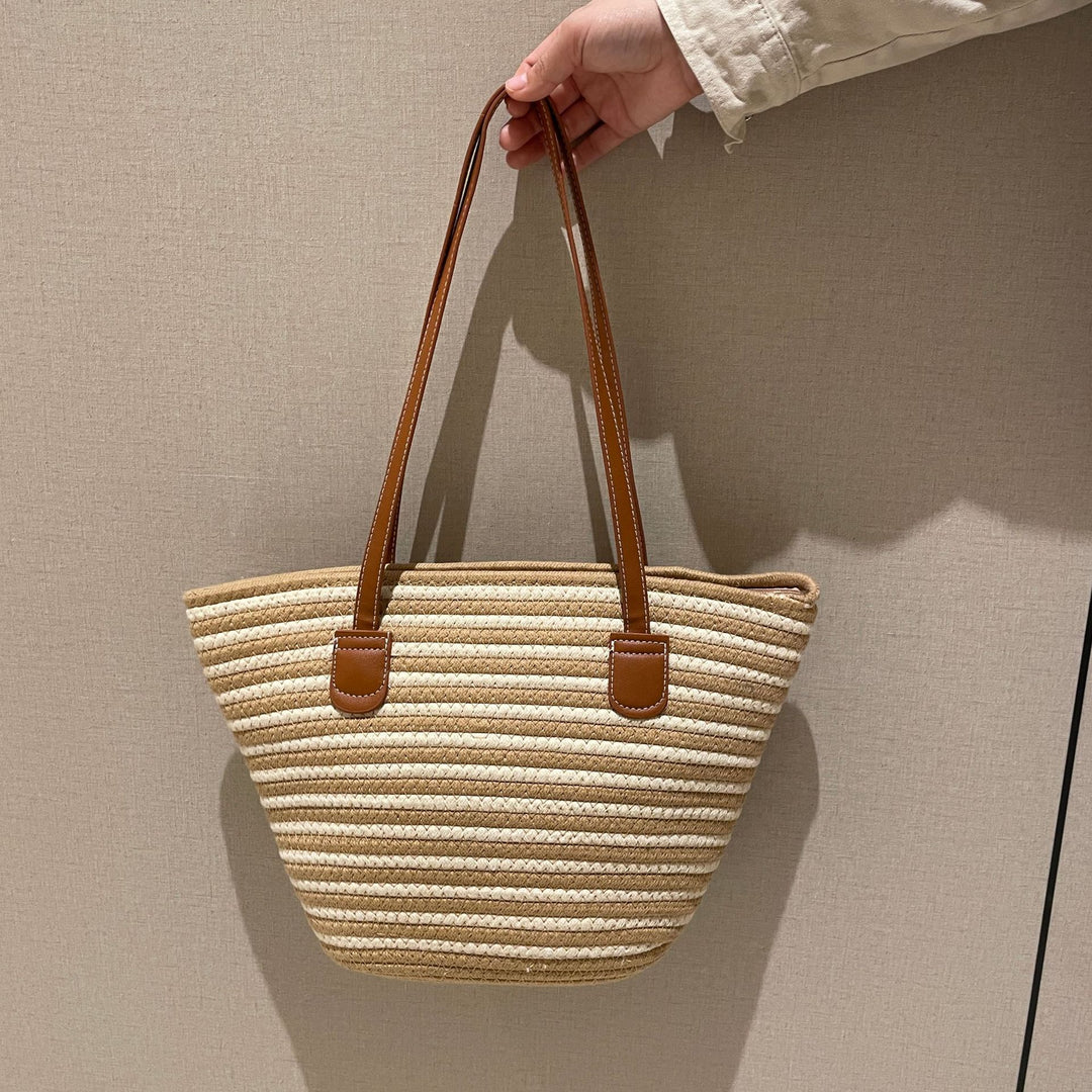 Trendy kurvveske med lærhåndtak Skanto