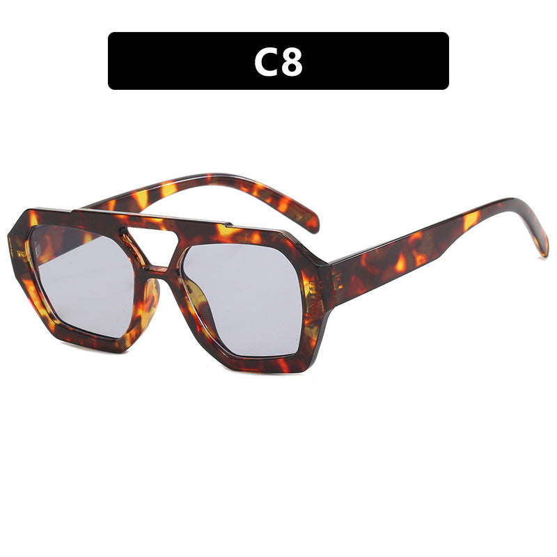 Dame oversized solbrille i markant, åttkantet design Skanto