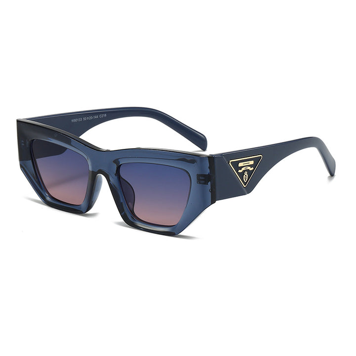 Dame Designer solbrille med moderne, geometrisk ramme Skanto