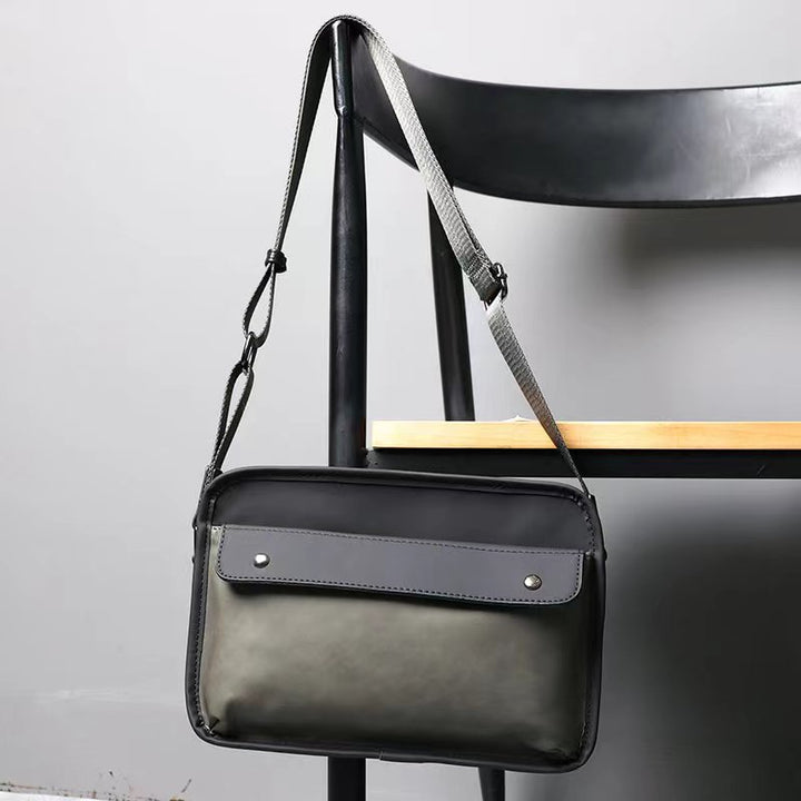 Elegant skulderveske med praktiske rom Skanto