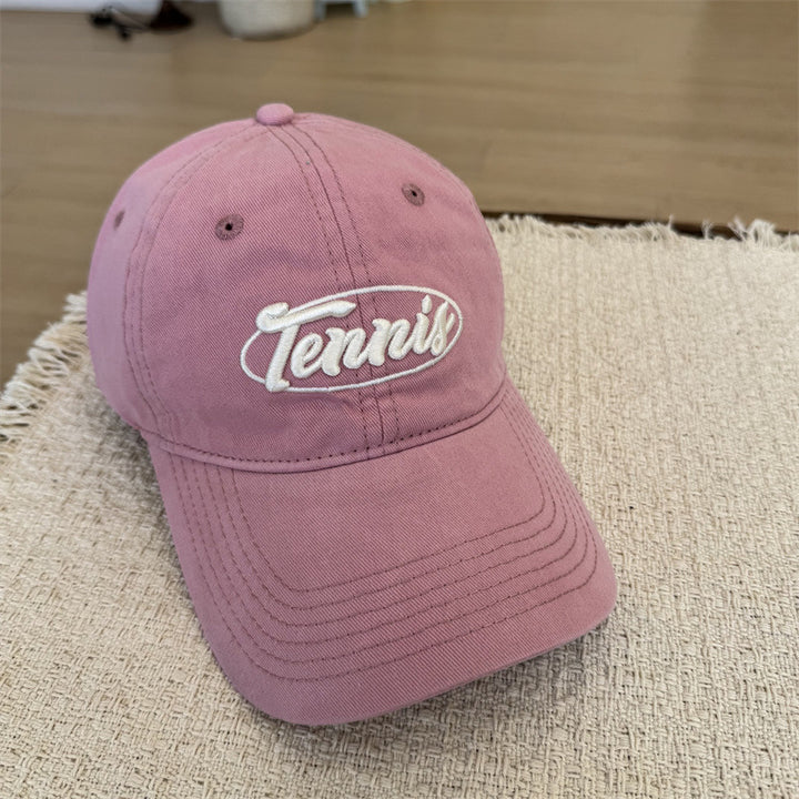 Herresportcaps med tennisgrafikk Skanto