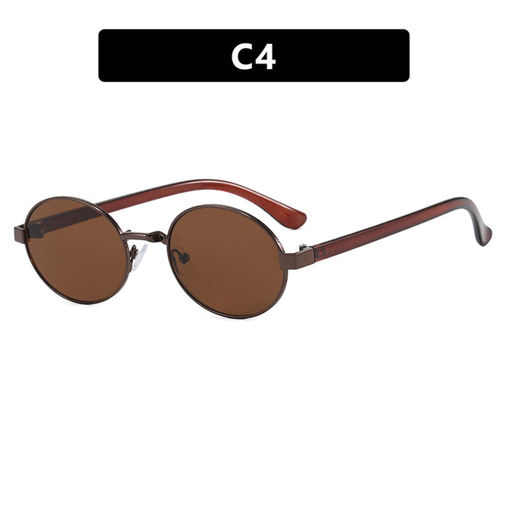 Dame rund brille med elegant metallramme og justerbare nesepads Skanto