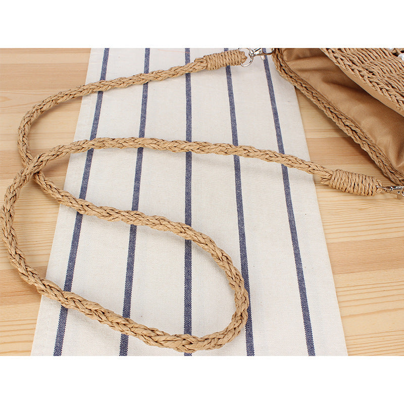 Handbag made of hand-woven natural material with bead decoration Skanto