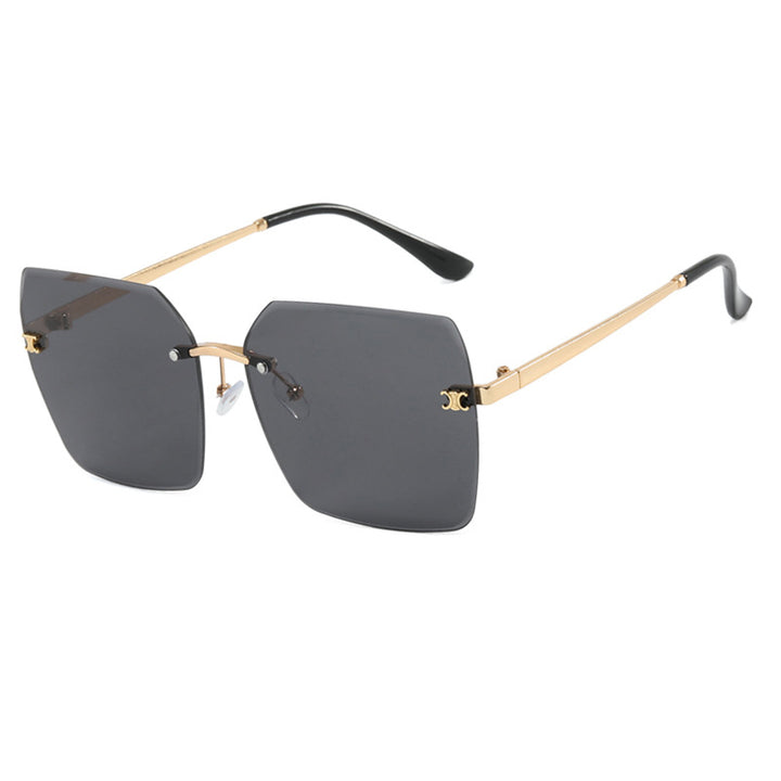 Dame firkantet solbrille i moderne design med filigran metallramme Skanto