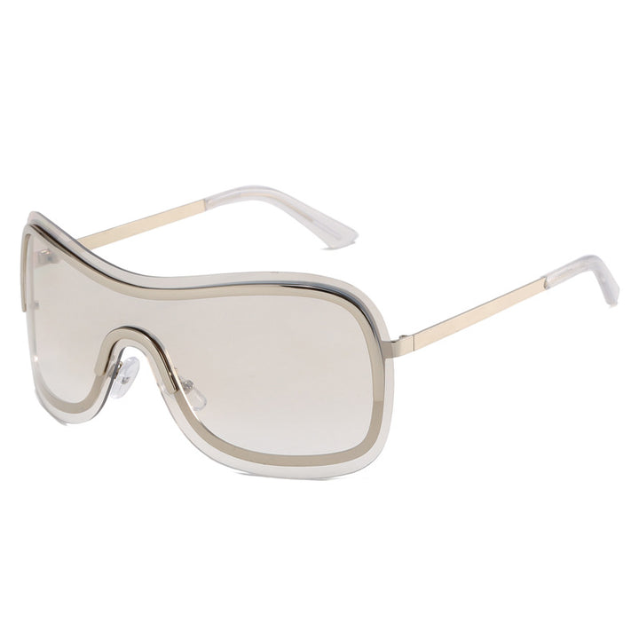 Dame stor rund solbrille med elegant metallramme Skanto