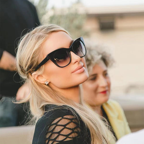 Dame solbrille i trendy katteøye-design med iøynefallende leopardmønster Skanto