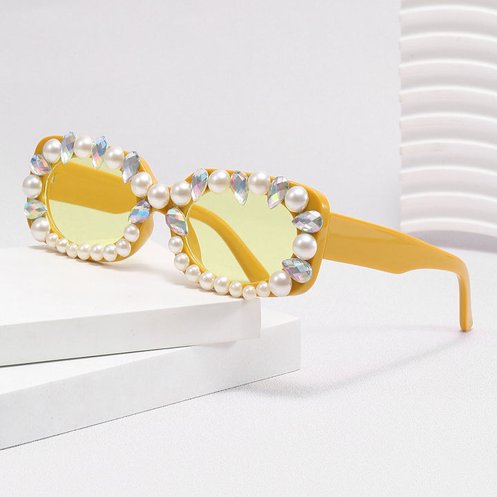 Damer elegant solbrille med perlepynt Skanto