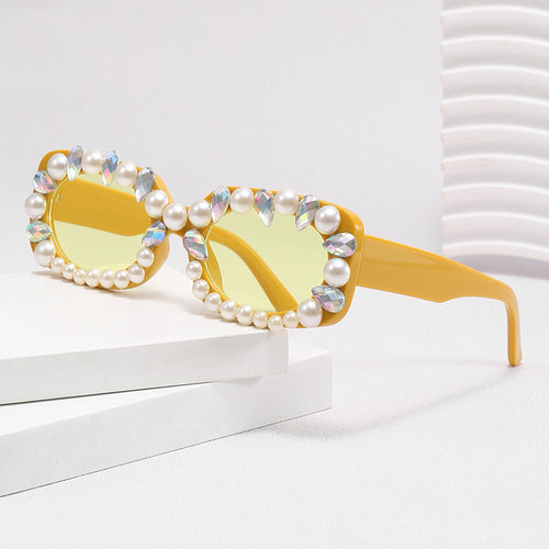 Damer elegant solbrille med perlepynt Skanto