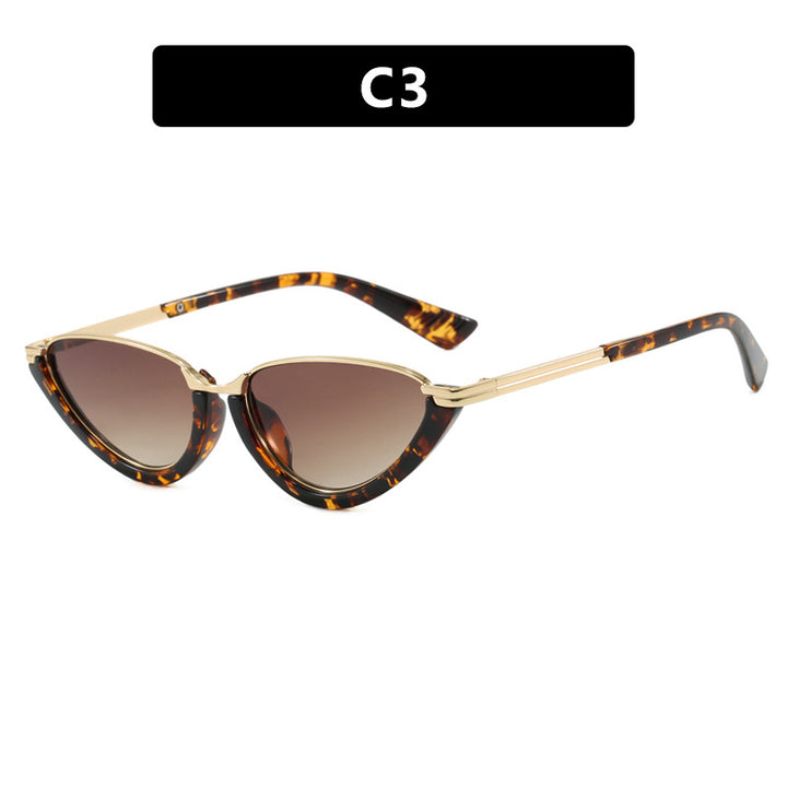 Dame futuristiske Cat-Eye solbriller med gyldne detaljer Skanto