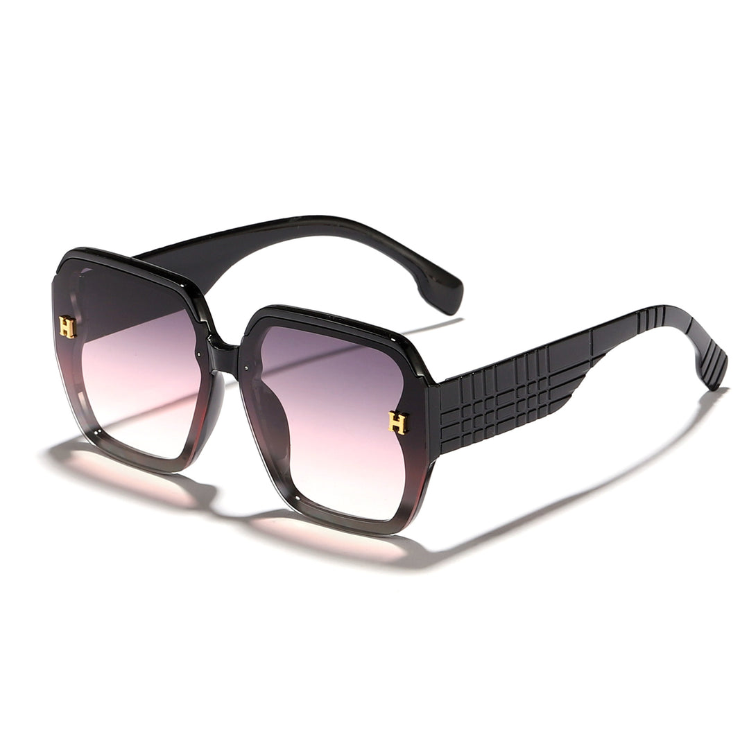 Damer moteriktig solbrille med kvadratisk ramme og trendy glass Skanto