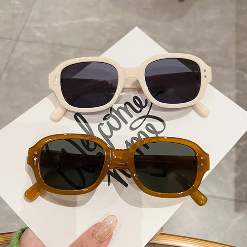 Damen modische solbrille med stor, firkantet ramme Skanto