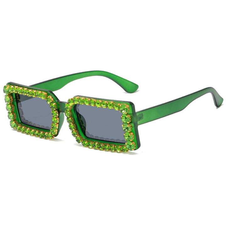 Dame moteriktig solbrille med glitrende rammedekorasjon Skanto