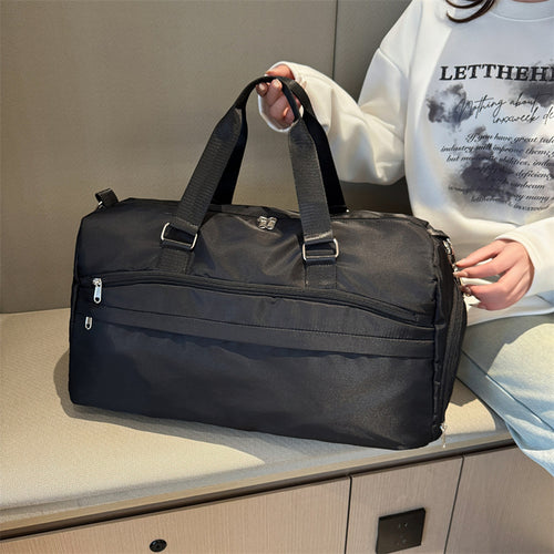 Elegant reiseveske med praktiske organisasjonselementer Skanto