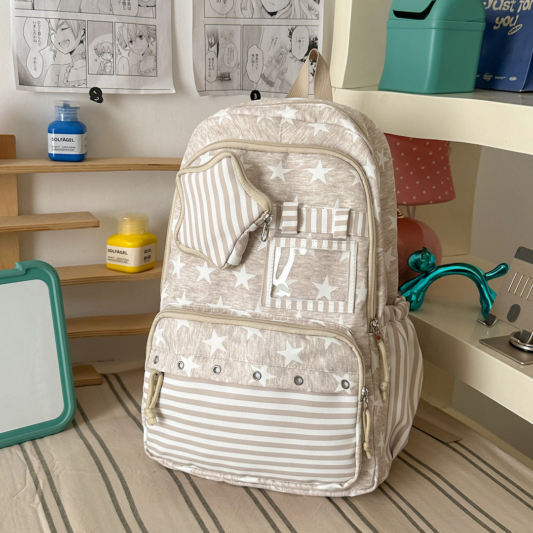 Sjarmerende stjernesmykket skole ryggsekk
