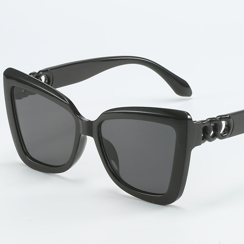 Dame moderne Cat-Eye solbriller med klar ramme og UV-beskyttelse Skanto