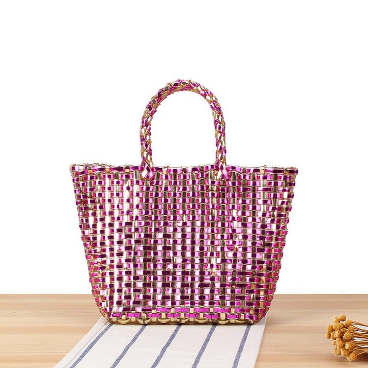 Handbag made of woven natural material with elegant accents Skanto