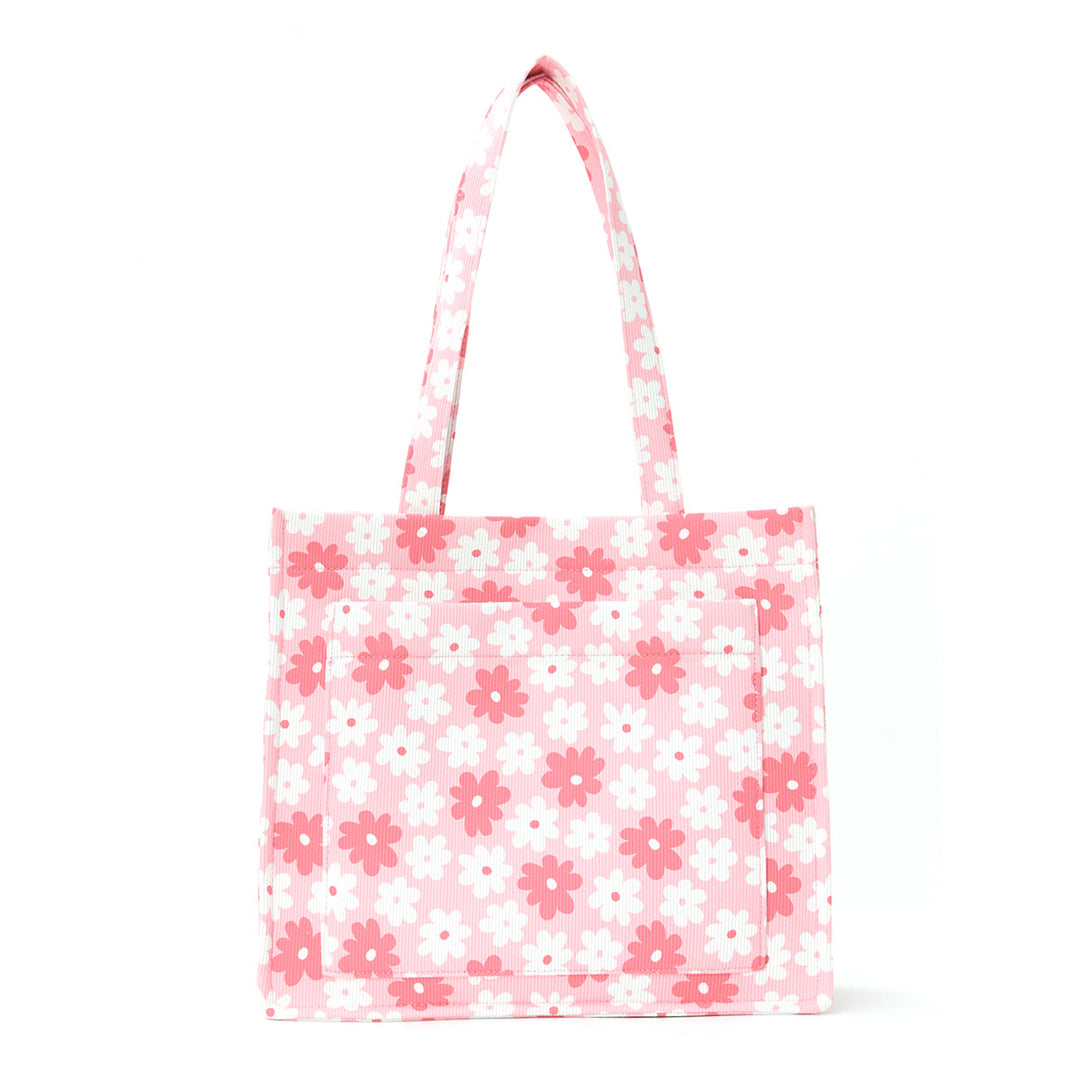 Trendete handlepose med blomsterdesign Skanto