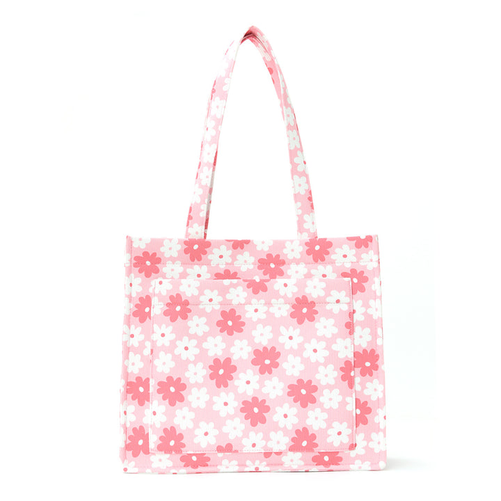 Trendete handlepose med blomsterdesign Skanto