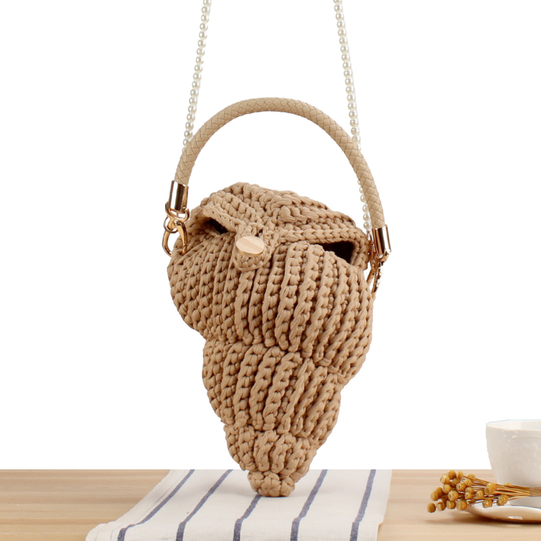 Elegant håndveske i muslingdesign Skanto